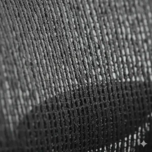 Detail shot of the breathable cooling mesh fabric used on a high-back ergonomic chair.