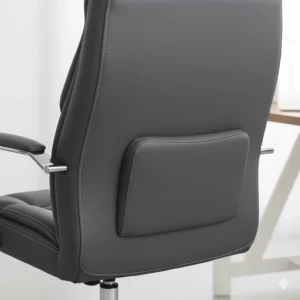 Back view of a faux leather office chair highlighting built-in lumbar support for better posture.