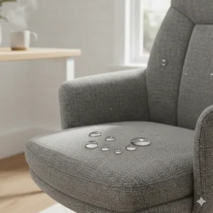 Close-up of water droplets beading on a stain-resistant fabric office chair, showing liquid-repellent technology.
