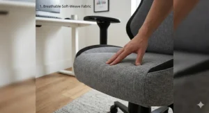 Close-up of breathable soft-weave fabric on a gaming chair, with a hand pressing into the cushion to demonstrate its textured and soft material for better airflow.