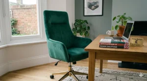 A stylish yet budget-friendly executive designer chair in faux black leather, positioned behind a contemporary office desk.