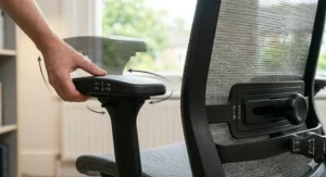 Ergonomic office chair with neck support and 4D adjustable armrests for tailored desk setups.