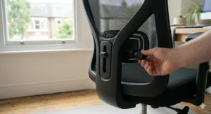 Rear view of the Amazon Basics office chair highlighting the contoured backrest for improved lumbar support.