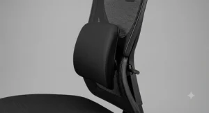 A U-shaped coccyx cushion placed on a standard dining chair for back and tailbone support.