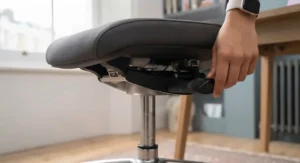 Multi-directional adjustable armrests on an office chair featuring additional lower back lumbar support.