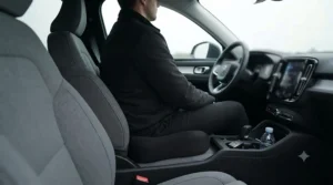 Orthopaedic seat cushion placed on a car driver seat for long-distance driving comfort