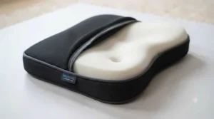 The machine-washable zip cover being removed from the lower back support cushion for easy cleaning.