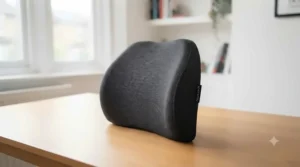 Memory foam back rest cushion placed on a desk chair, showing its contouring shape.